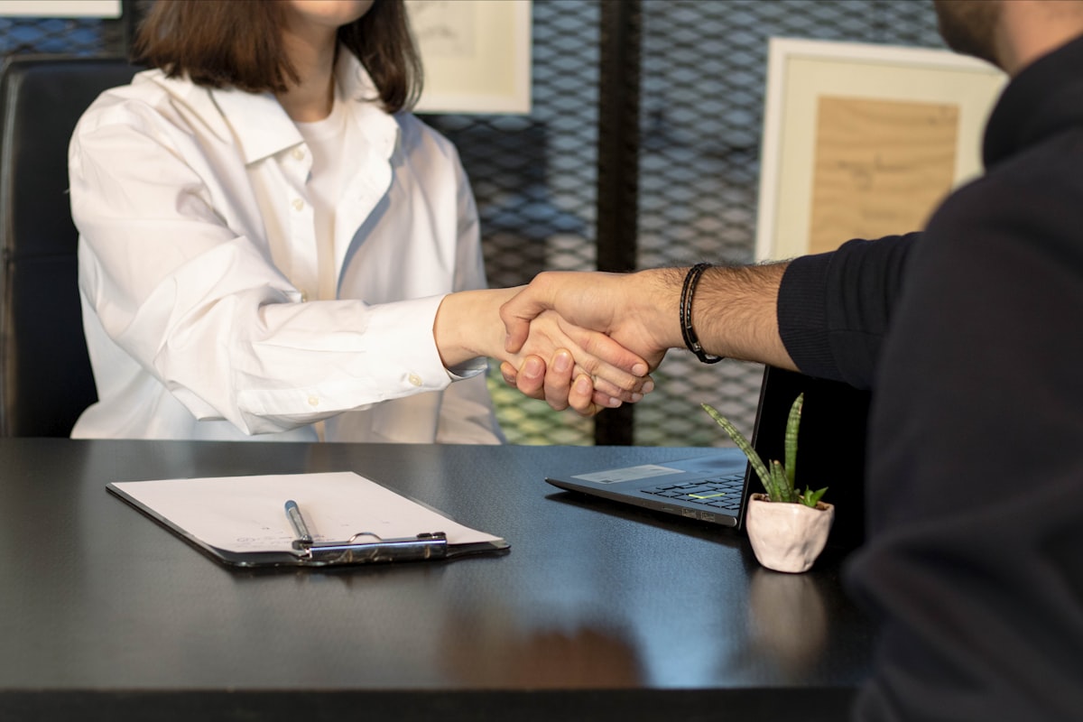 Business handshake representing choosing an independent insurance agency in Wisconsin